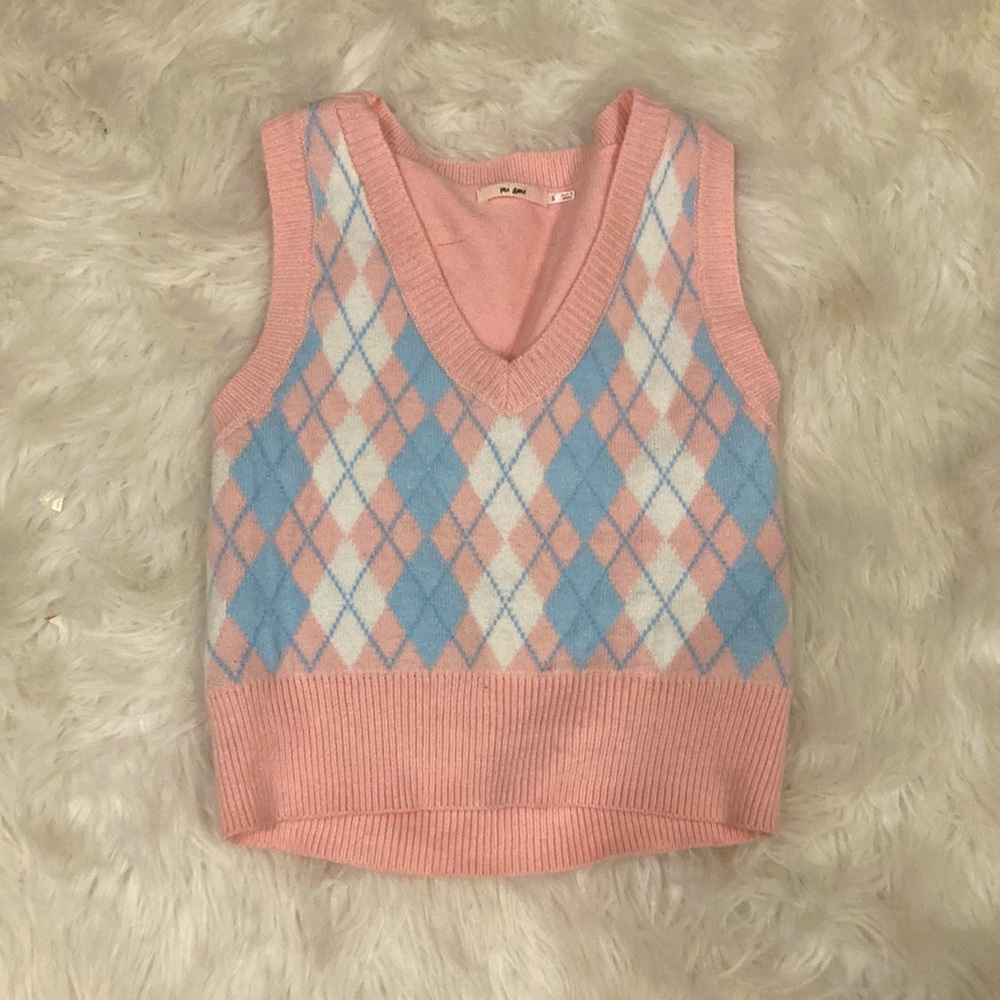 Soft sweater vest from Miami and great over a cute white blouse!